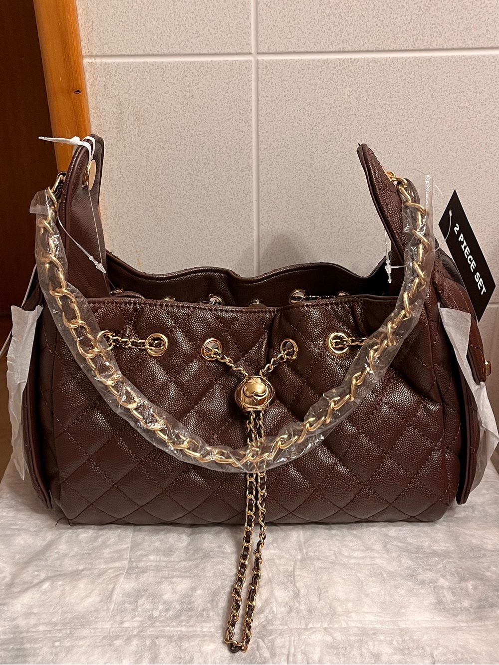 ELLO “Alyssa” Quilted coffee drawstring Shoulder Bag with Gold Chain Detail